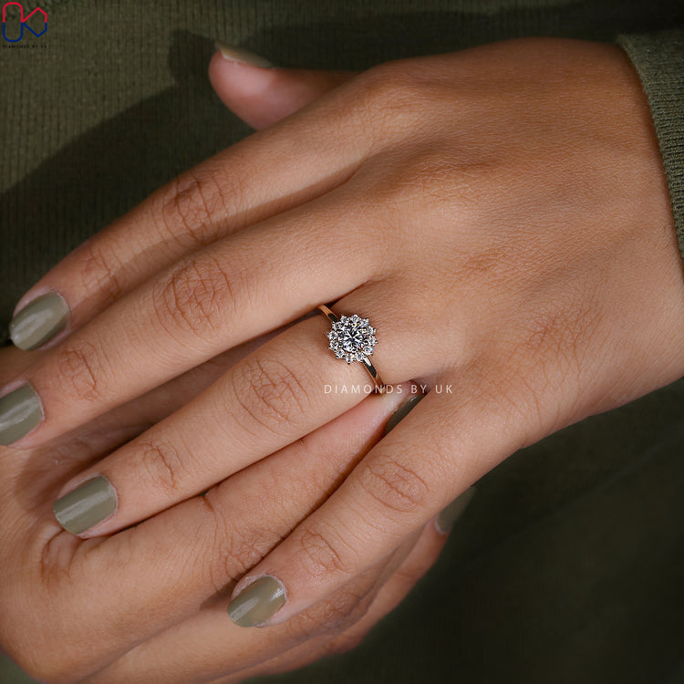 Custom halo diamond ring with round center stone.
