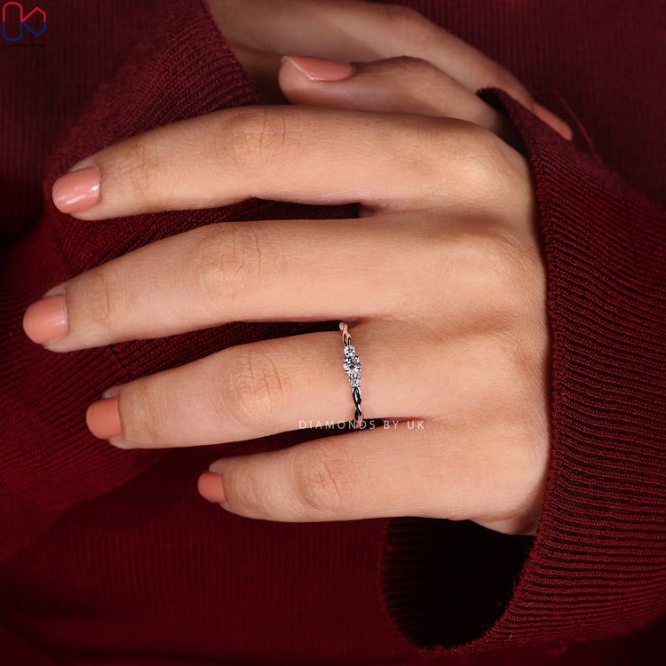 Diamondsbyuk ring with 3 round diamonds in a white gold setting.
