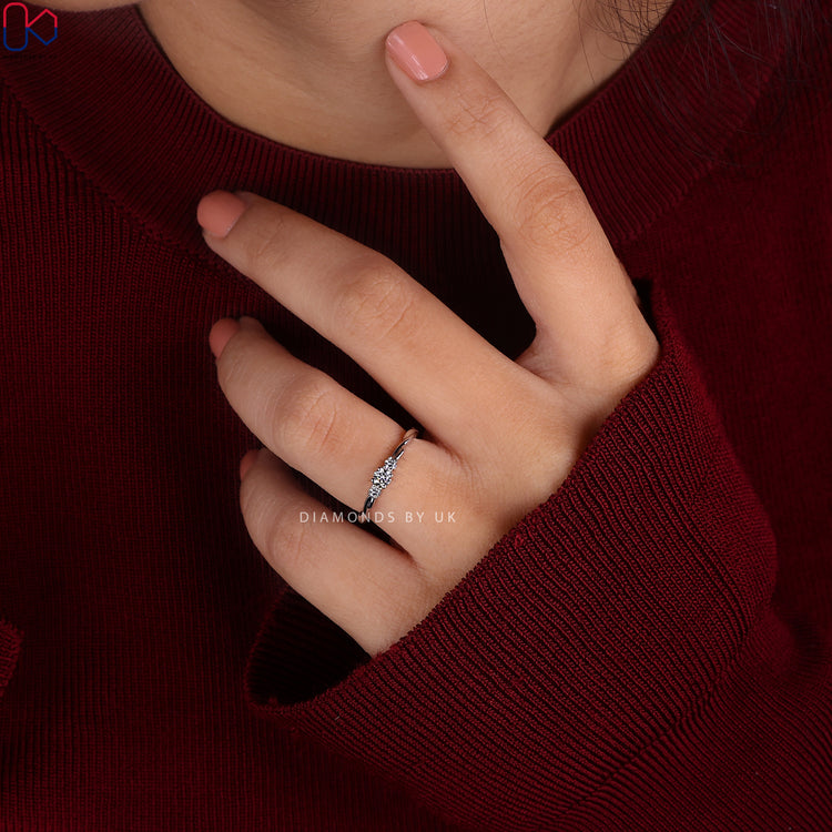 3 stone round diamond ring crafted in white gold.
