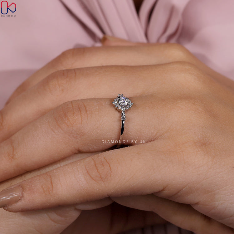 Lab grown diamond engagement ring with prong setting in white gold.
