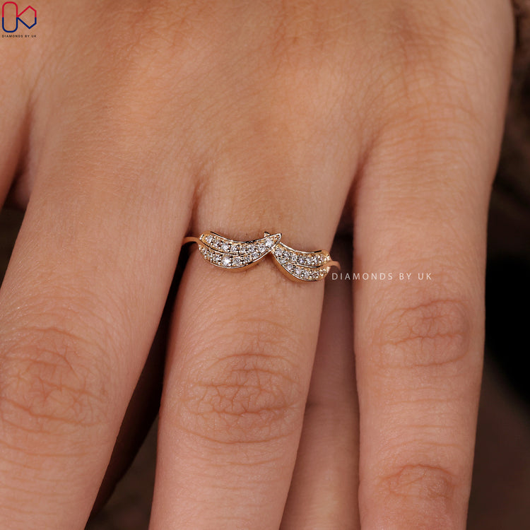 Unique engagement ring with a stunning prong setting.
