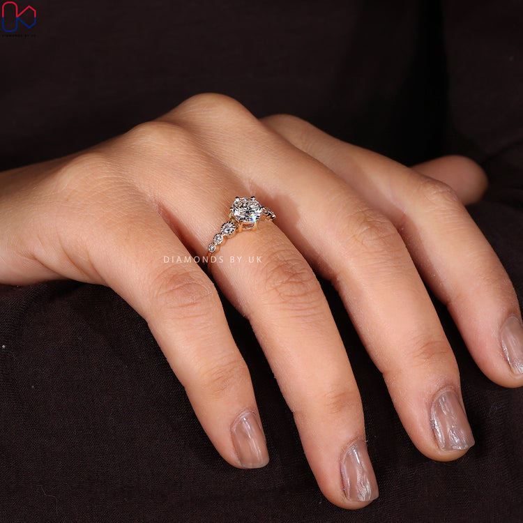 Six prong engagement ring setting with round diamond.
