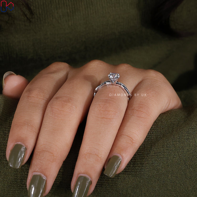 Handmade ring with round cut diamond ring.
