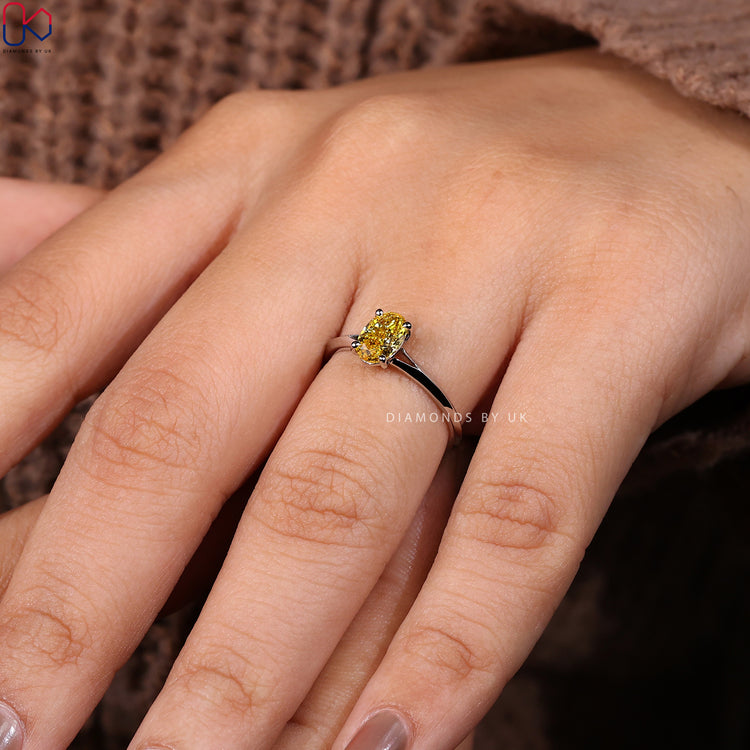 Canary yellow diamond ring set in white gold.
