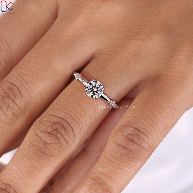 White Gold Ring featuring a stunning round diamond design.
