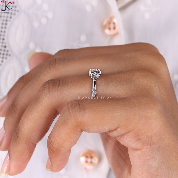 Handmade Jewelry featuring a white gold round diamond engagement ring.
