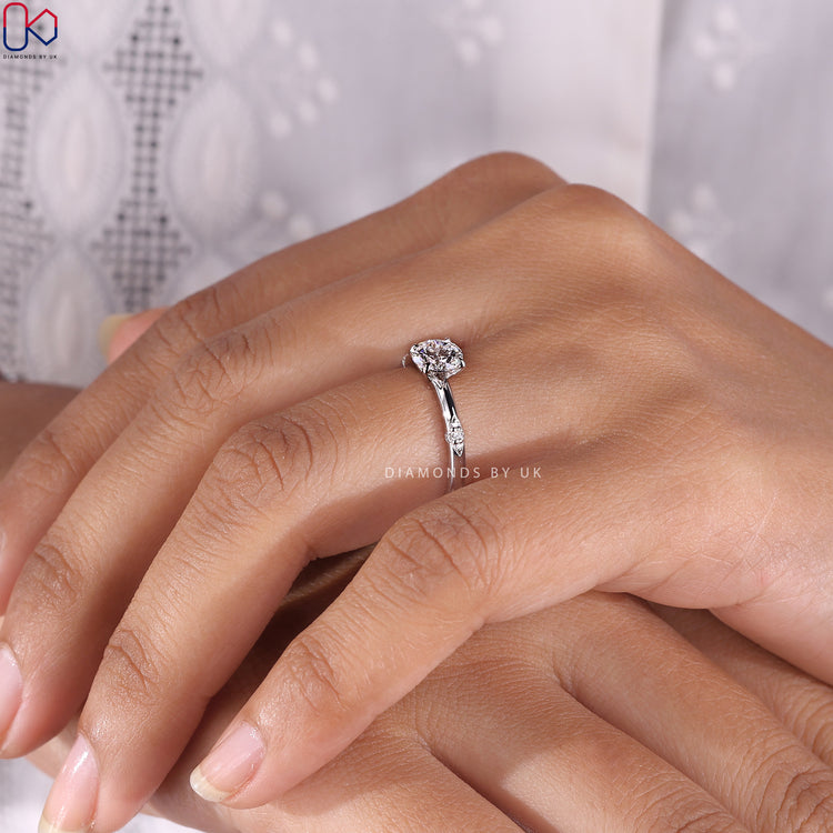 Diamondsbyuk Engagement Ring with a round diamond and white gold setting.
