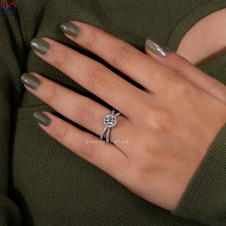 Diamondsbyuk ring with a sparkling round diamond ring in a pave setting ring design.
