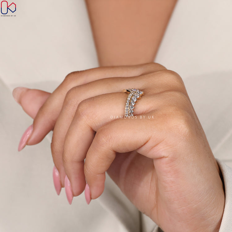 Half eternity band crafted in yellow gold with custom design.
