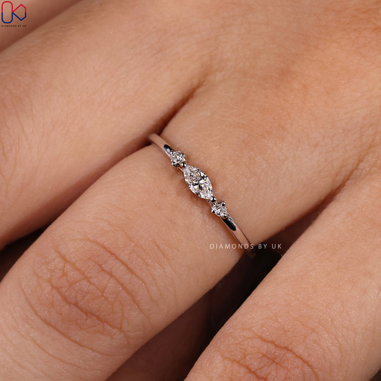 Handmade jewellery showcasing prong set diamond band style.
