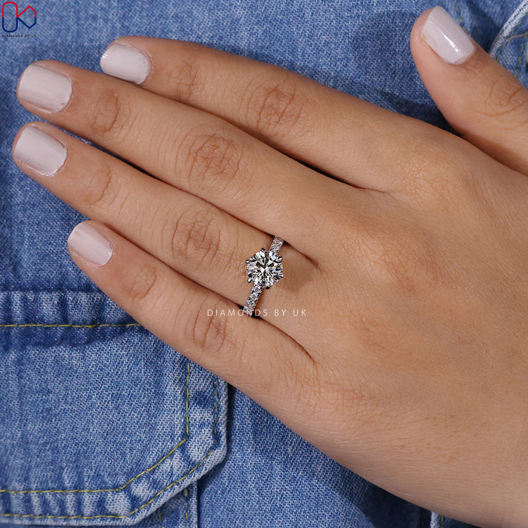Buy engagement ring featuring a classic tulip setting.
