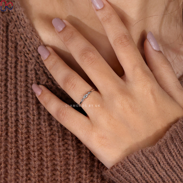 Round cut side stone band made with Lab Grown Diamond sparkle.
