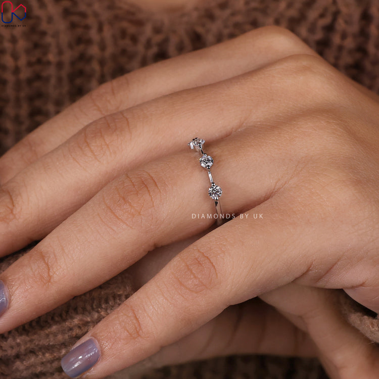 Distance pave diamond band for a modern sparkle.
