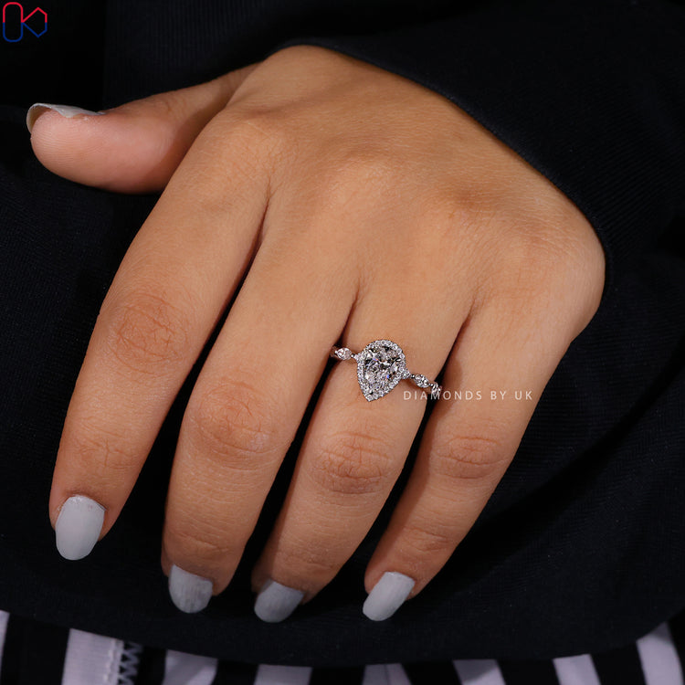 Shared prong setting in a handmade diamond ring.

