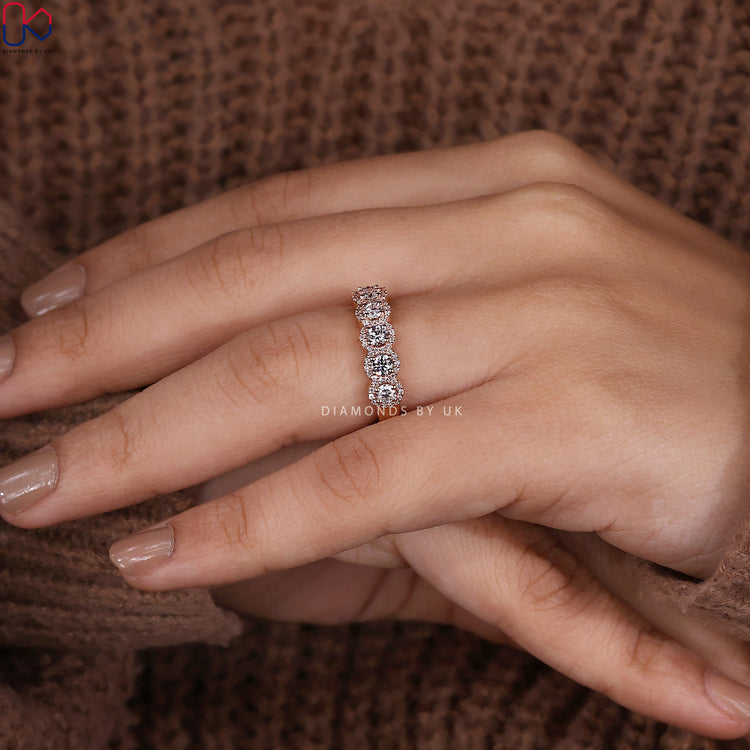 halo setting band accented with seven stone diamond band
