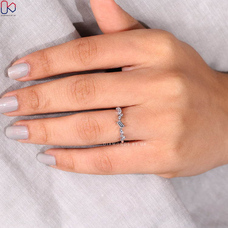 Lab Grown Diamond placed in half eternity diamond band setting.
