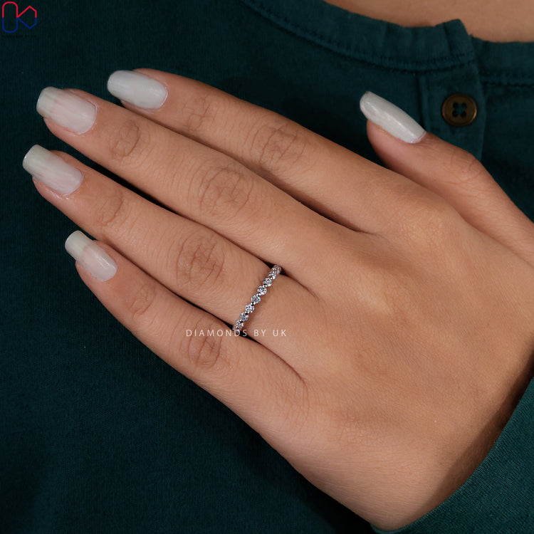 A stunning white gold wedding band adorned with Lab Grown Diamond for a sustainable touch.
