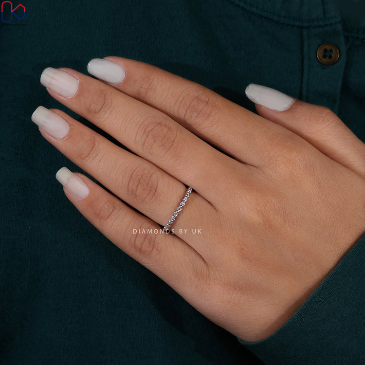 Lab grown diamond round wedding band for an eco-friendly choice.
