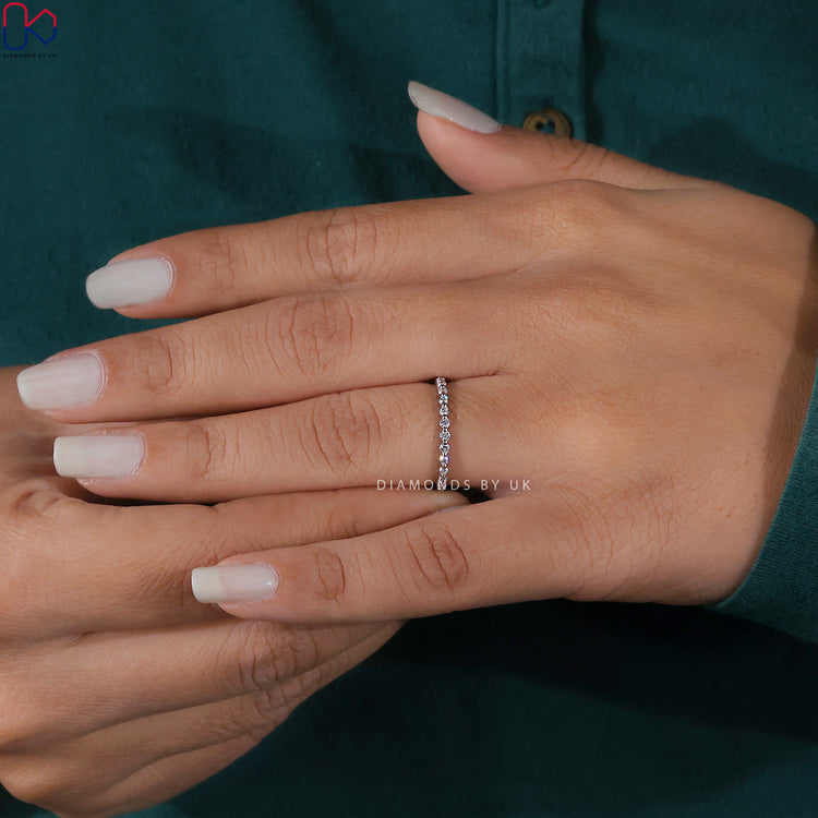 Shared prong band showcasing elegant diamond placement.
