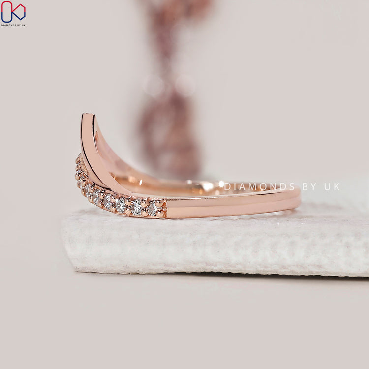 Custom wedding band from Diamondsbyuk in rose gold.
