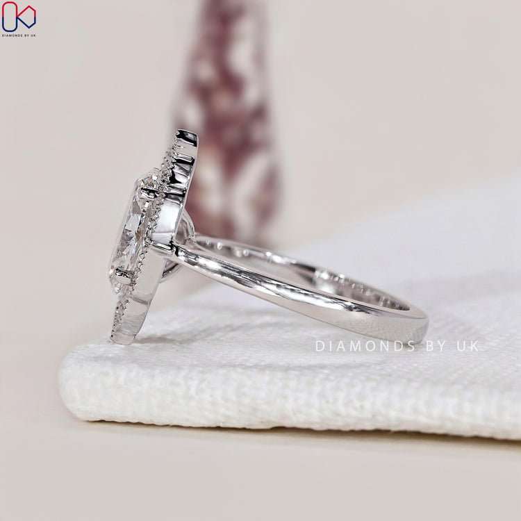 Handmade ring with a gorgeous oval halo engagement ring design.
