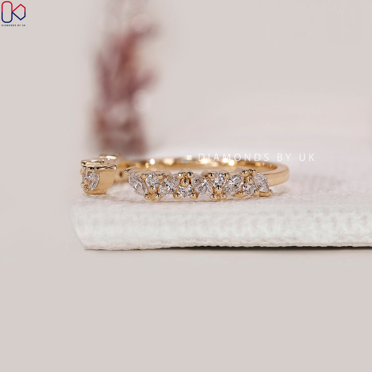 Round prong setting band with lab grown diamonds.
