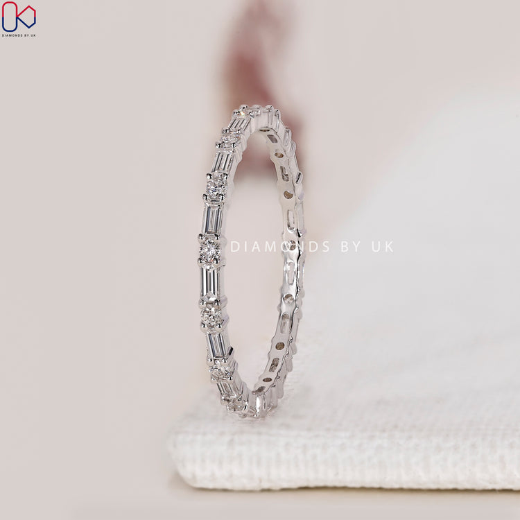 Lab grown diamond eternity band with white gold setting.
