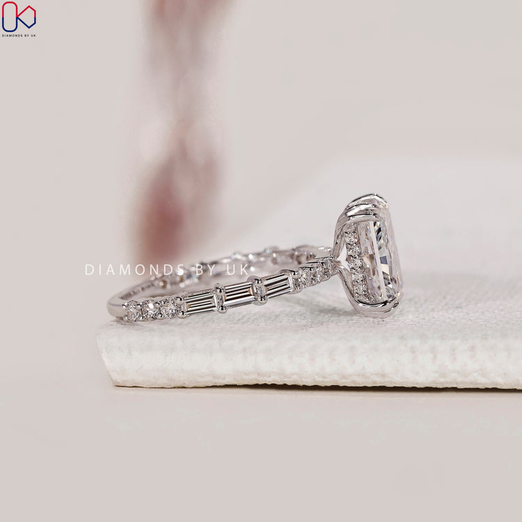 Lab grown radiant cut diamond ring with a hidden halo setting.
