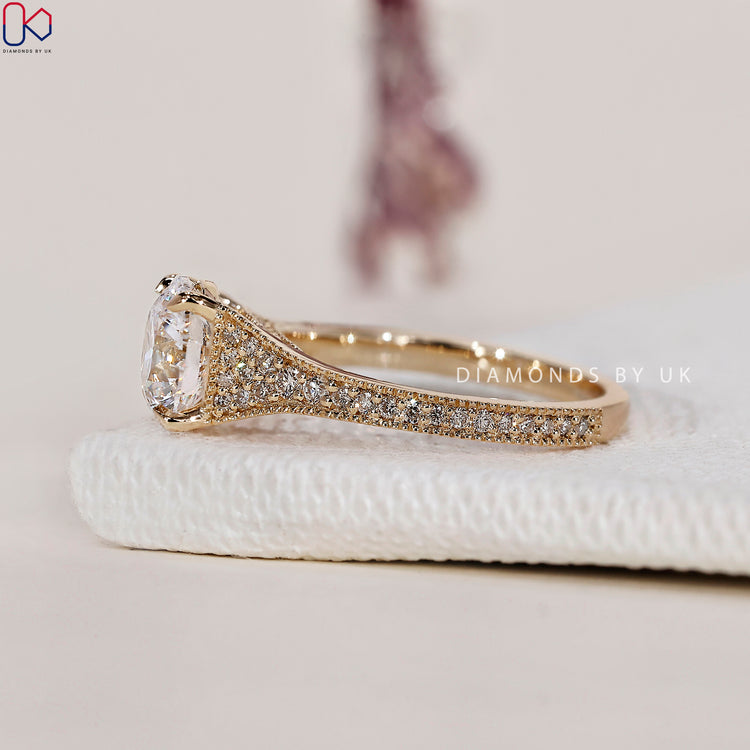 Lab Grown Diamond set in a round brilliant cut diamond ring for sustainable luxury.