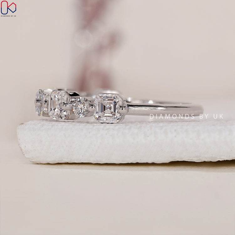 White gold wedding band with a sleek and polished finish.
