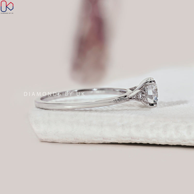 Customise your ring with a unique round cut diamond and white gold.
