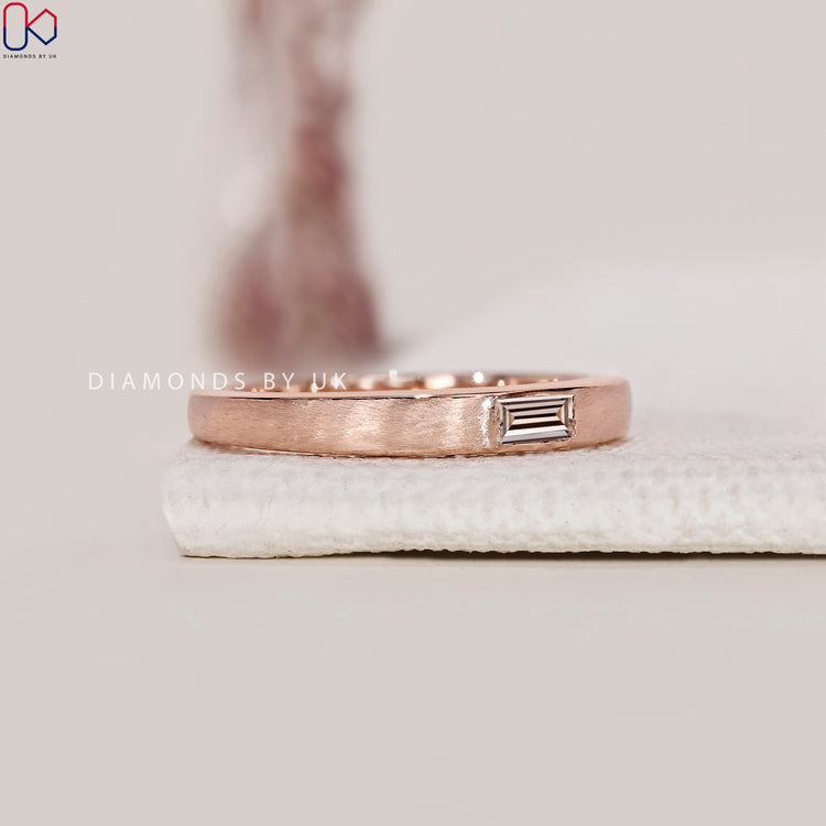 DiamondsbyUK wedding band crafted in rose gold finish.
