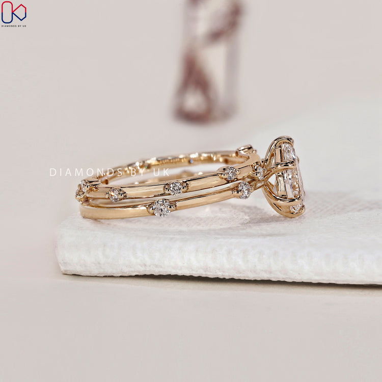 6 prong set pear engagement ring for a secure, elegant look.

