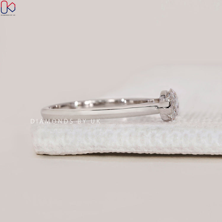 DiamondsbyUK white gold marquise engagement ring.
