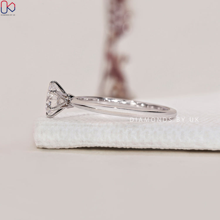 Proposal ring with a sparkling round diamond.
