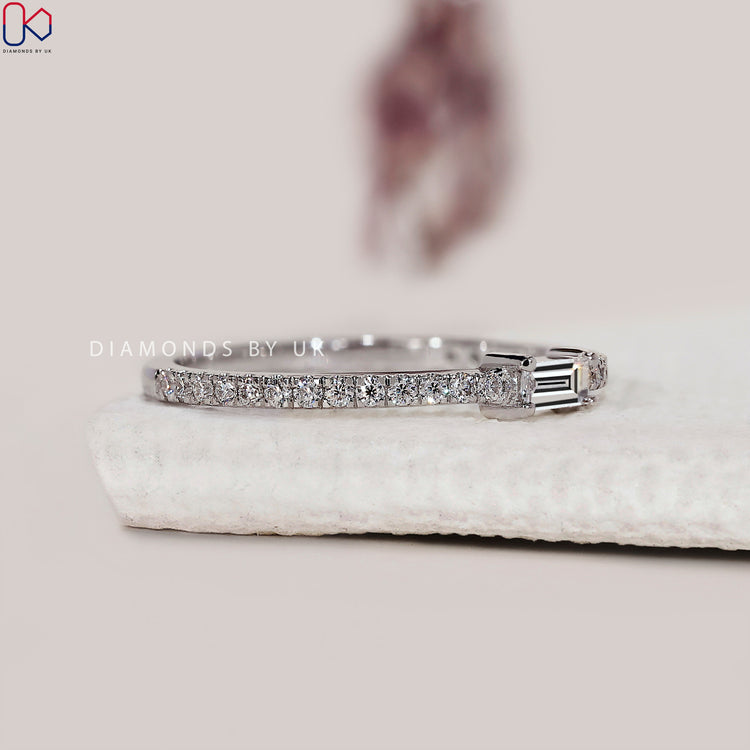 Buy diamond band with both baguette and round cut diamonds.
