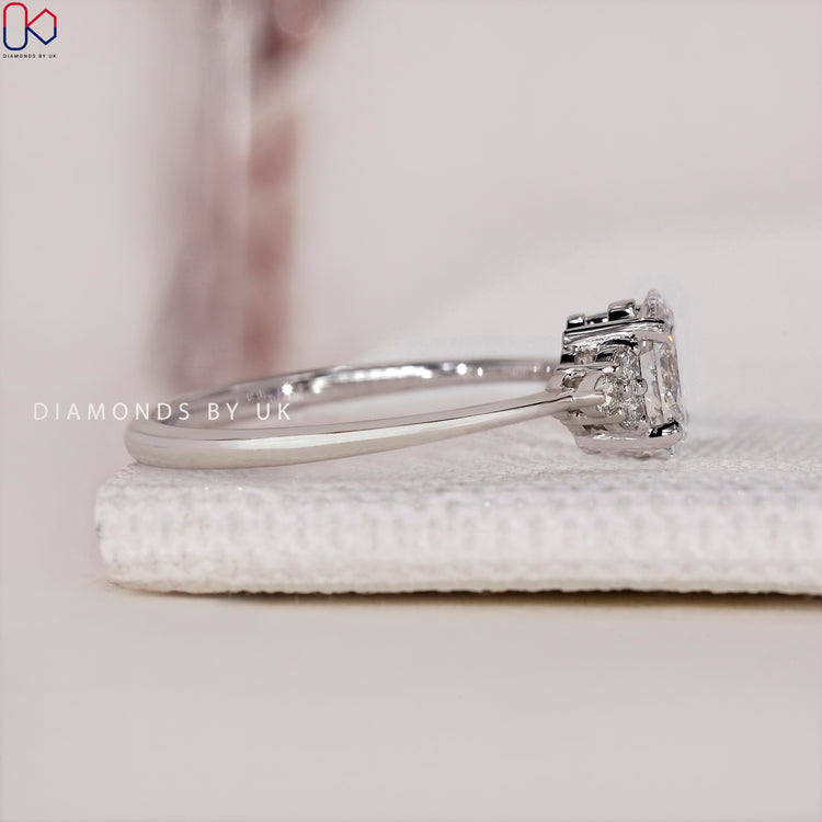 Engagement ring UK with an elegant Oval Diamond Engagement Ring and unique setting.
