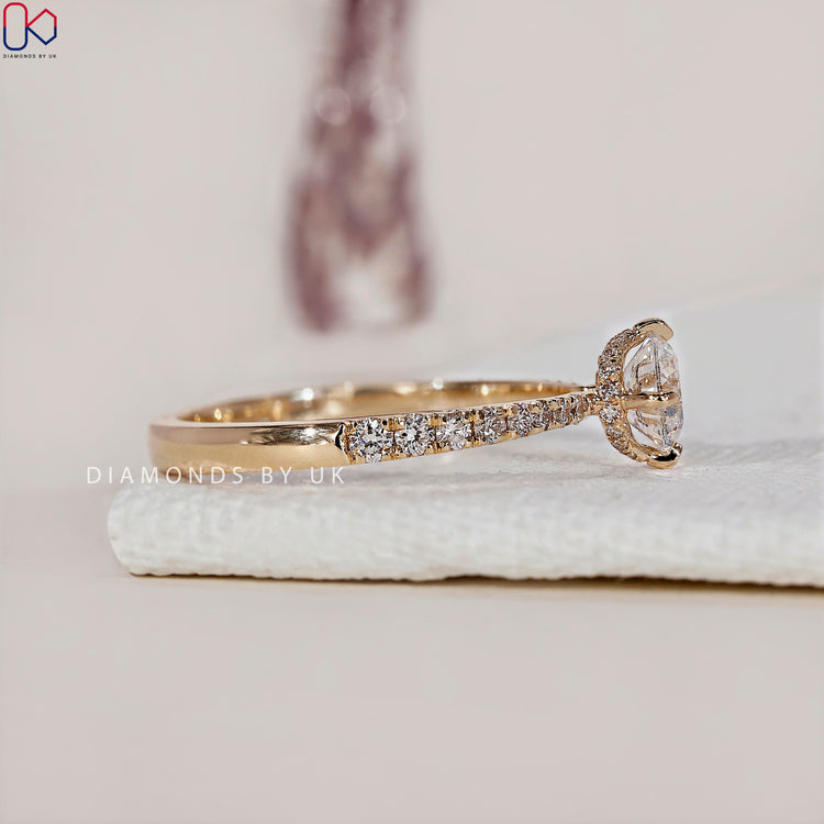 Engagement ring UK featuring a stunning hidden halo engagement ring design.

