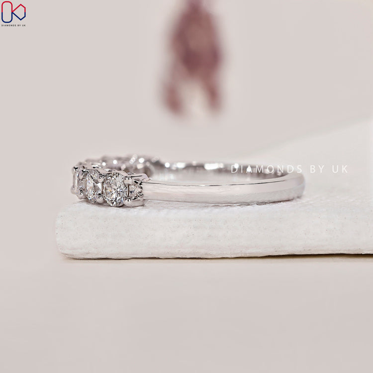 Customise your wedding band with round cut lab diamonds.
