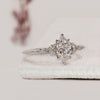 Knife edge shank marquise diamond engagement ring.