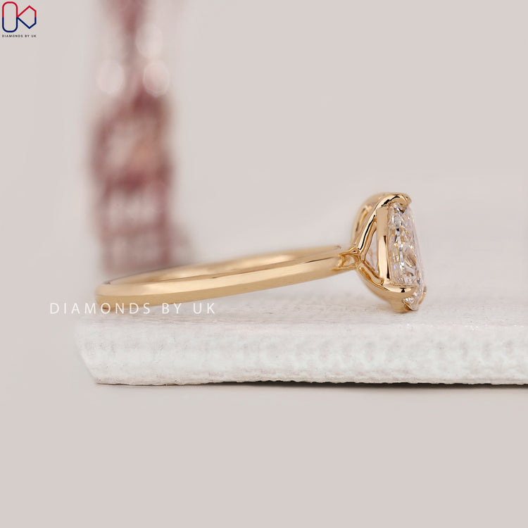 Buy engagement ring featuring prong setting and lab-grown diamonds.

