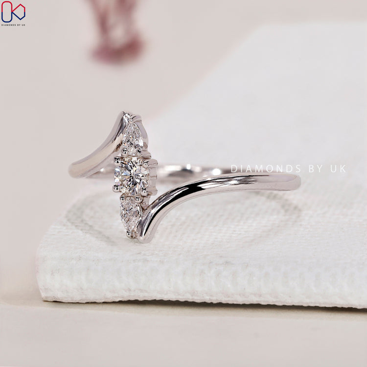Bypass setting engagement ring with diamonds
