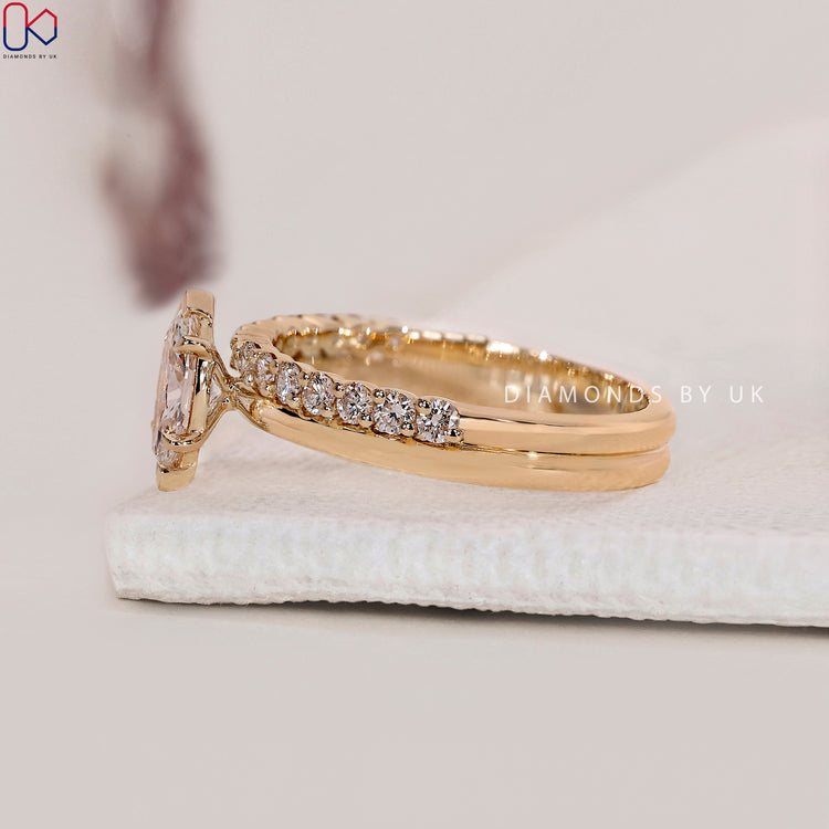 Bridal ring sets UK featuring a marquise solitaire design.
