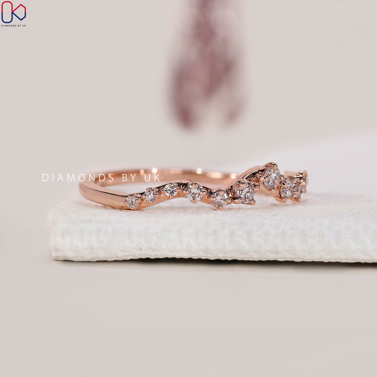 Buy diamond band featuring round cut lab grown diamonds.
