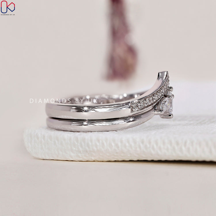 Handmade jewellery showcasing a one-of-a-kind V shaped wedding band
