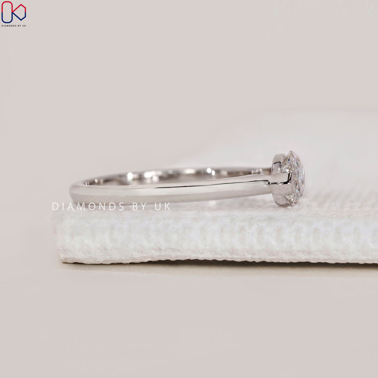 DiamondsbyUK white gold marquise engagement ring.
