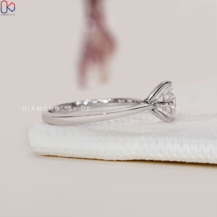 Customise your ring with a round cut diamond in white gold.
