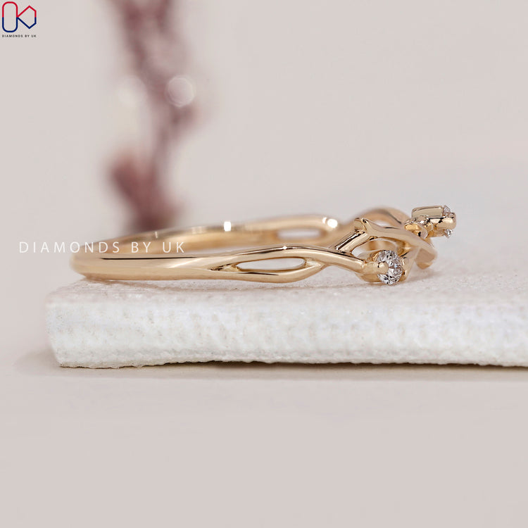 A round diamond wedding band with lab grown diamonds, ideal for sustainable jewellery.