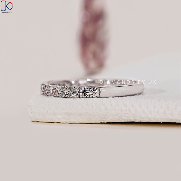 Customise your wedding band with round lab grown diamonds.
