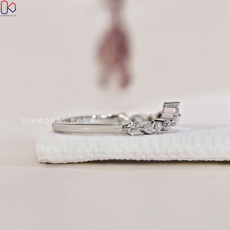 White gold diamond wedding band featuring a timeless and elegant look.
